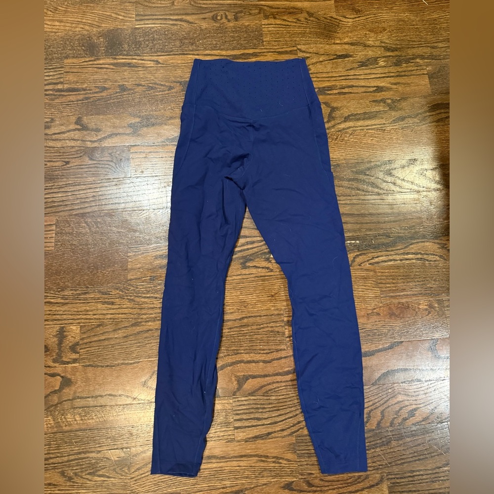 Nike dri-fit blue leggings. Side pocket. Size medium. Great color!